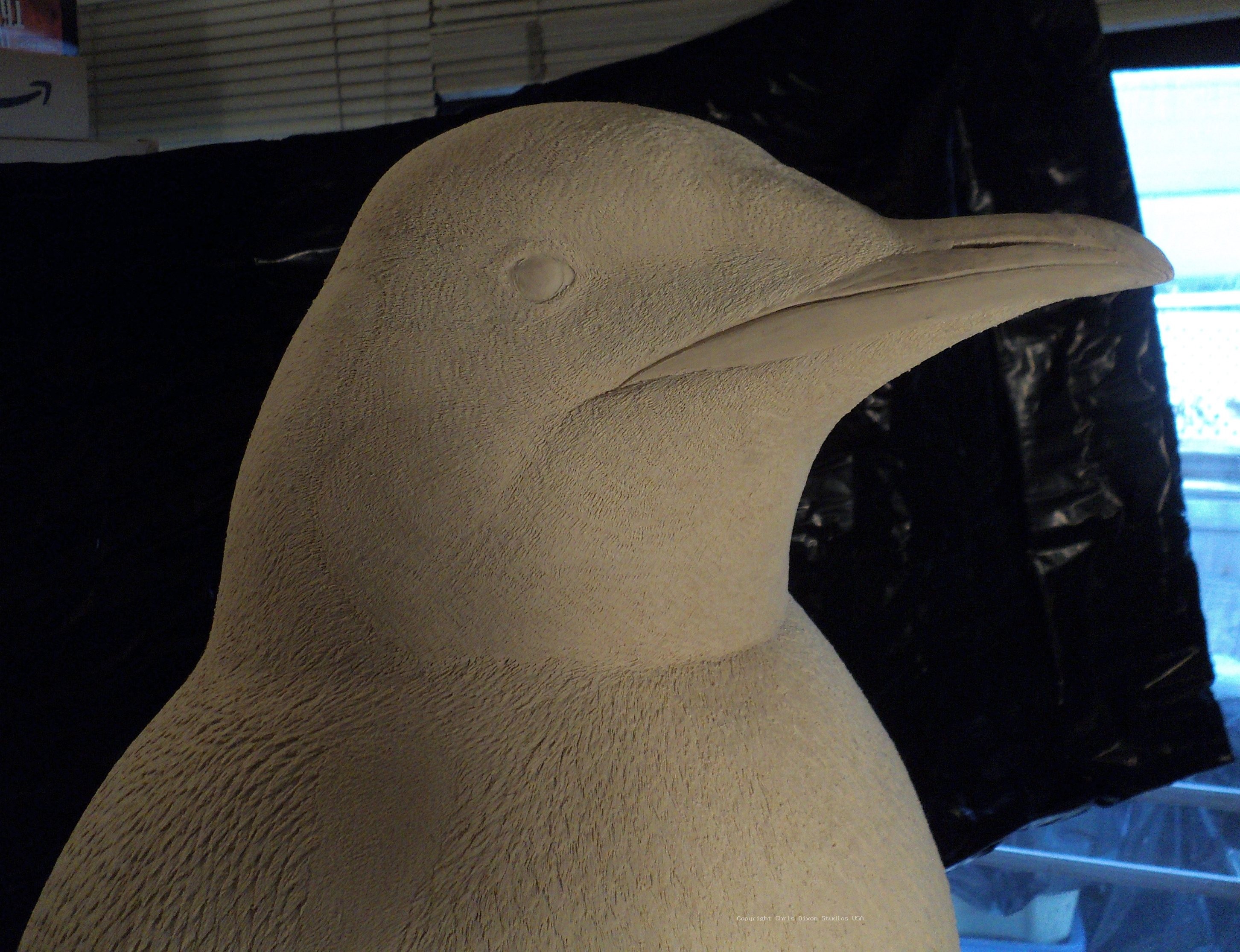 Emperor Penguins Carved75
